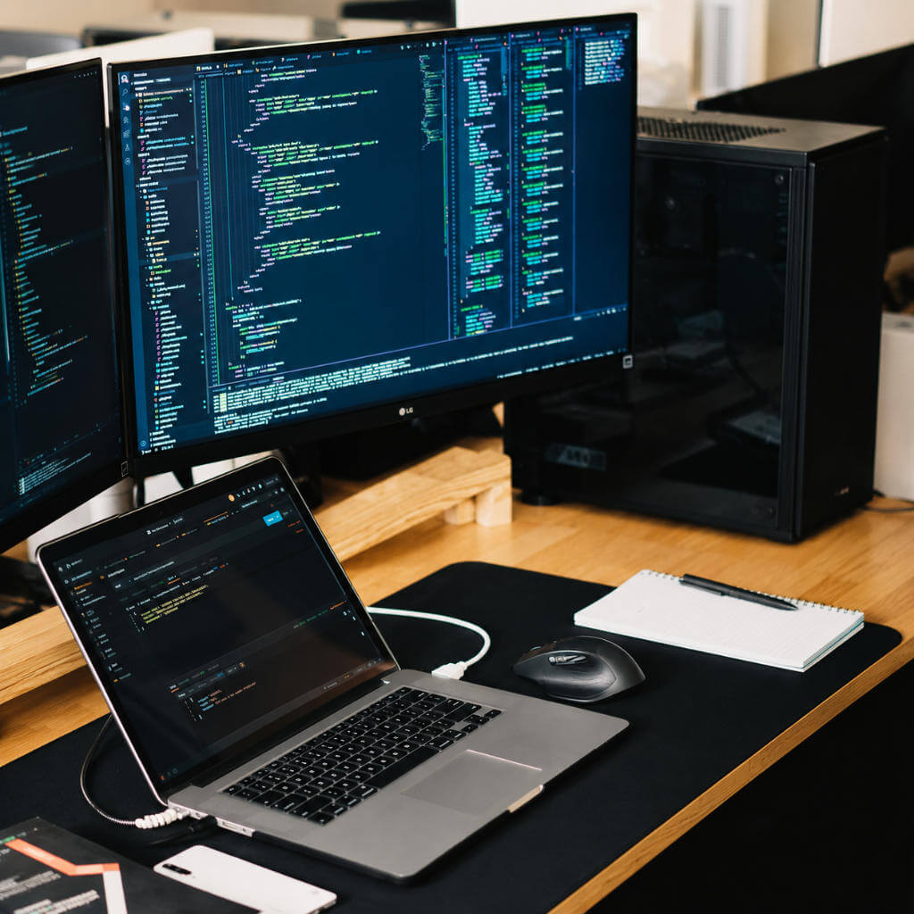 Software development of a web and mobile application at a multi-screen workstation